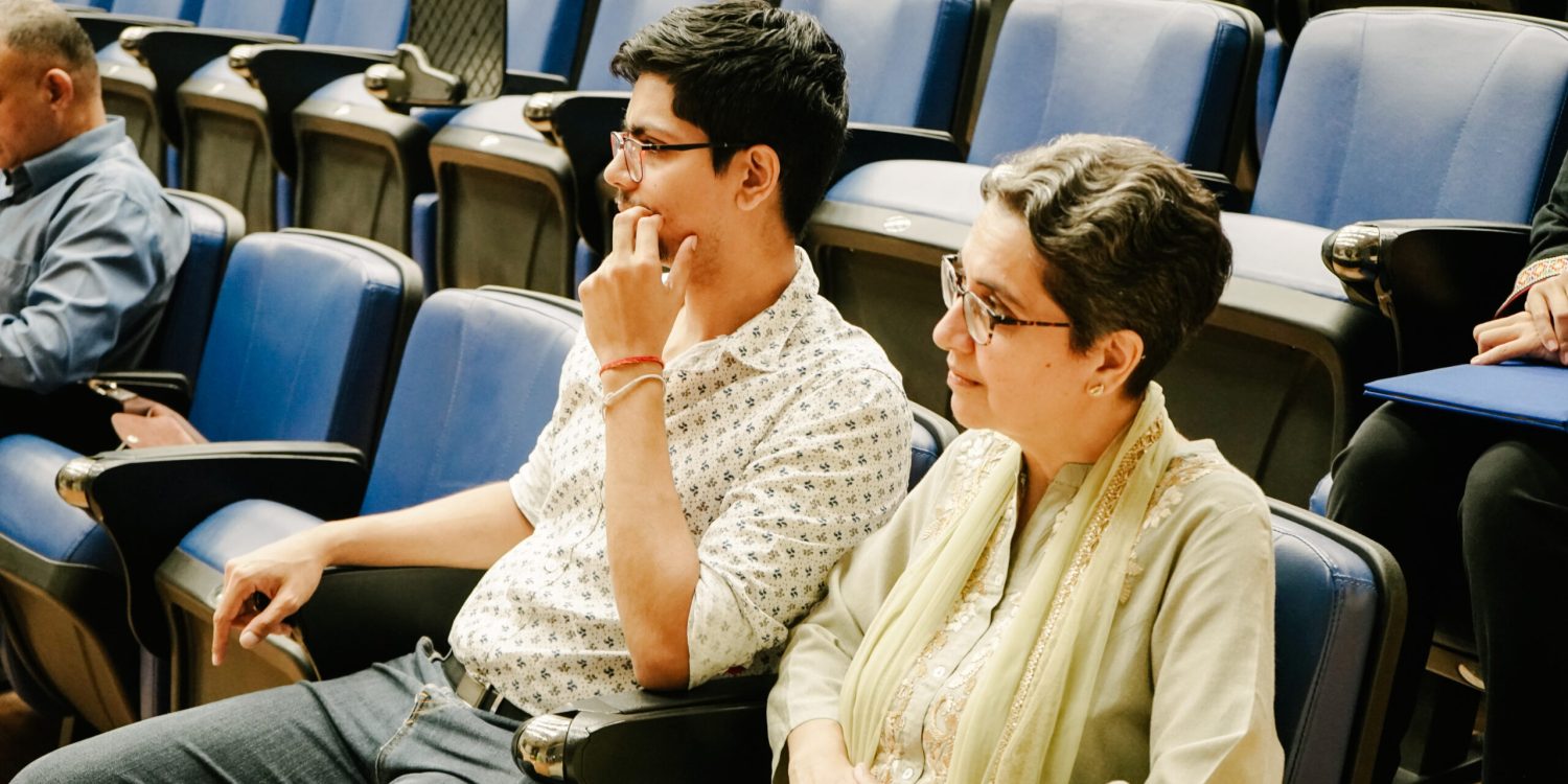 Listening intently to the talk on Ayurveda.
